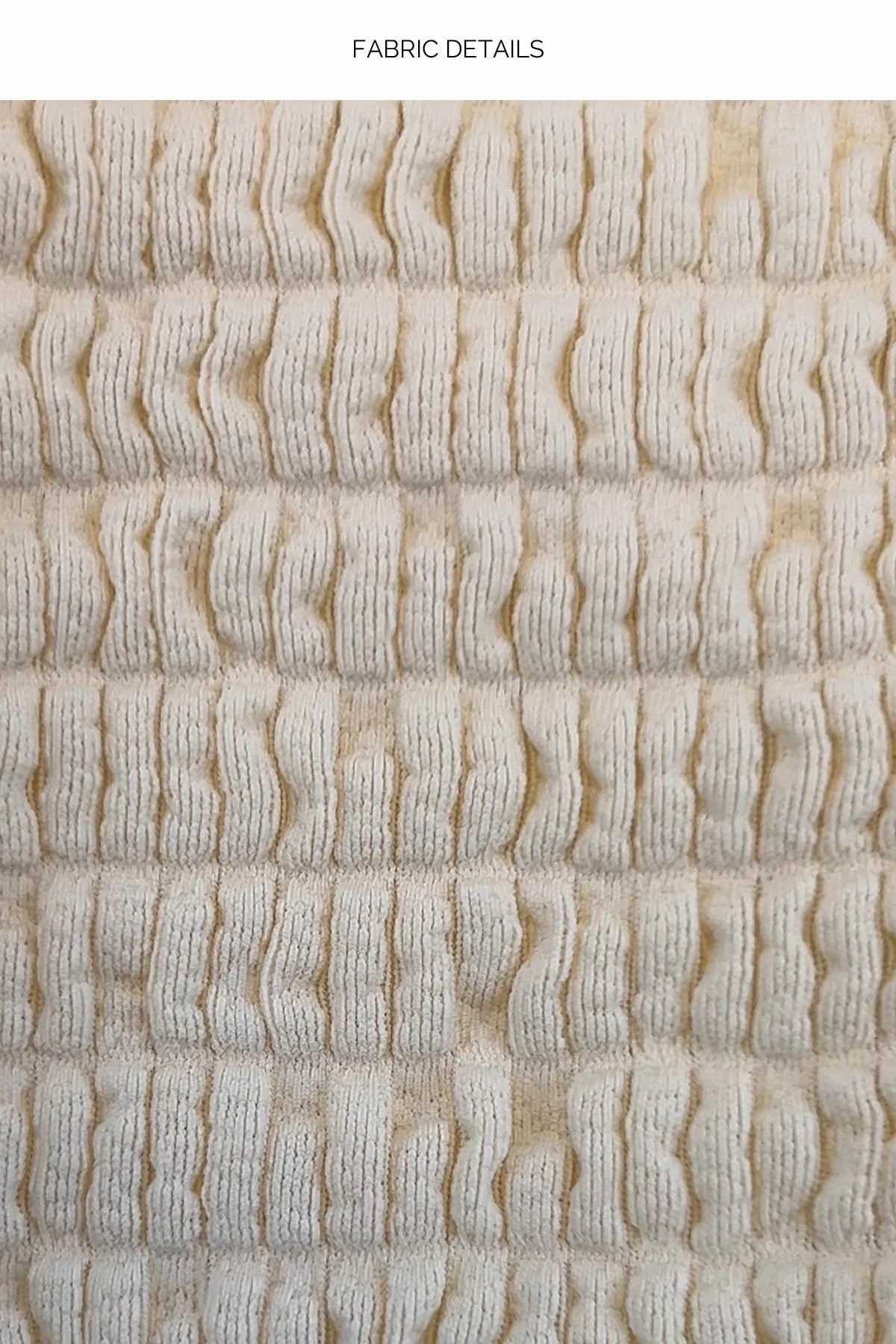 Close-up of textured beige fabric with a wavy pattern
